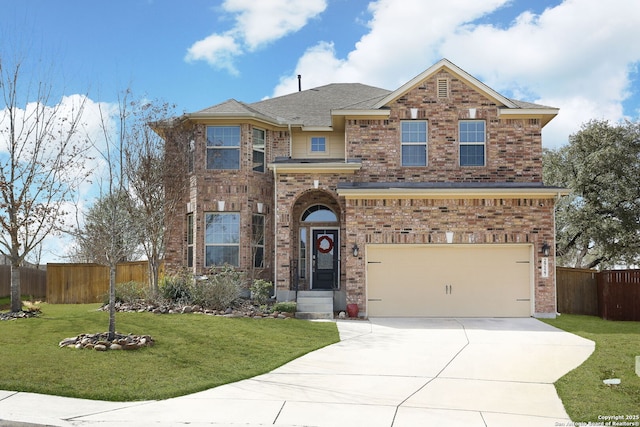 traditional-style home with concrete driveway, a front lawn, fence, and brick siding