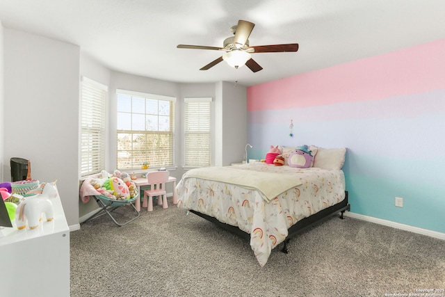 carpeted bedroom featuring ceiling fan and baseboards