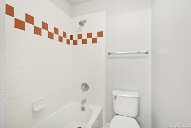 bathroom featuring toilet and tub / shower combination