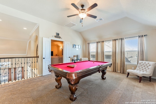 playroom featuring carpet, visible vents, and vaulted ceiling