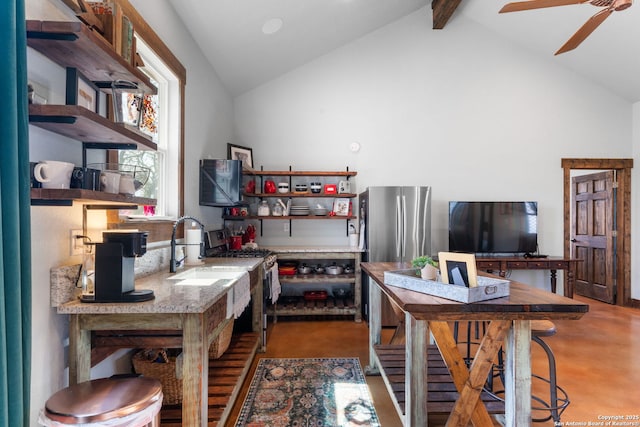 home office featuring ceiling fan, high vaulted ceiling, concrete floors, and beam ceiling