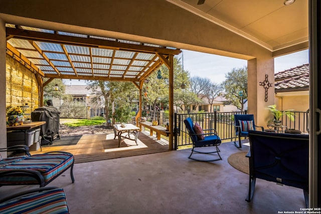 view of patio / terrace featuring a grill, a deck, and a pergola