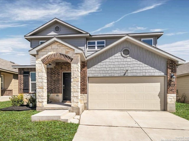 view of front of house featuring a garage, concrete driveway, brick siding, and stone siding