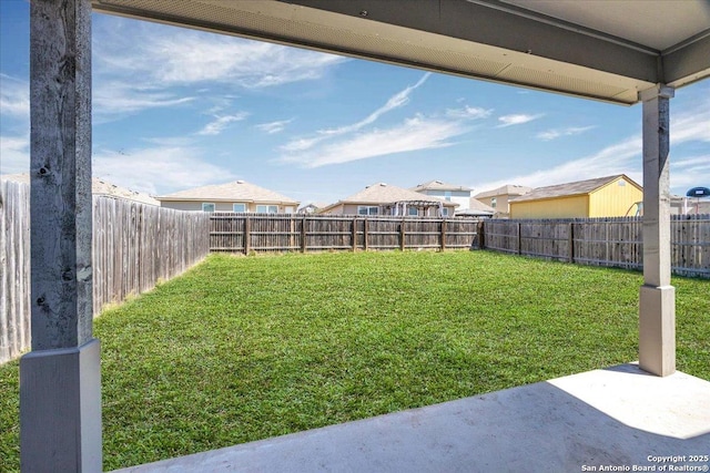 view of yard featuring a fenced backyard