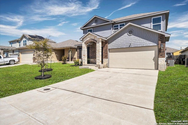 view of front facade featuring driveway, stone siding, an attached garage, cooling unit, and a front lawn