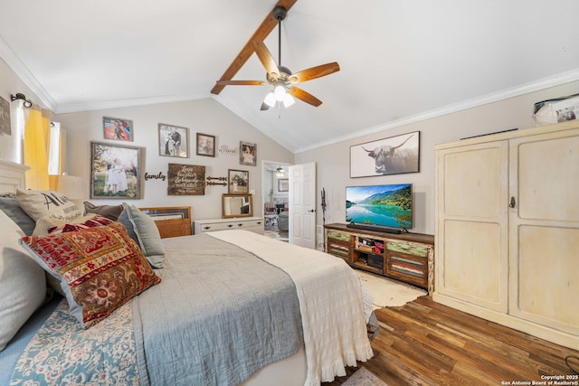 bedroom with ornamental molding, vaulted ceiling, ceiling fan, and wood finished floors