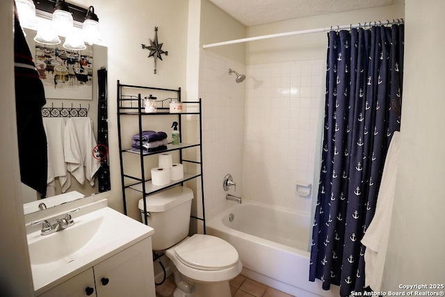 bathroom featuring shower / tub combo, vanity, toilet, and tile patterned floors