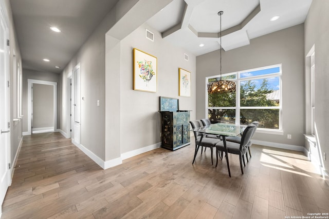 dining area featuring recessed lighting, light wood-style flooring, and baseboards