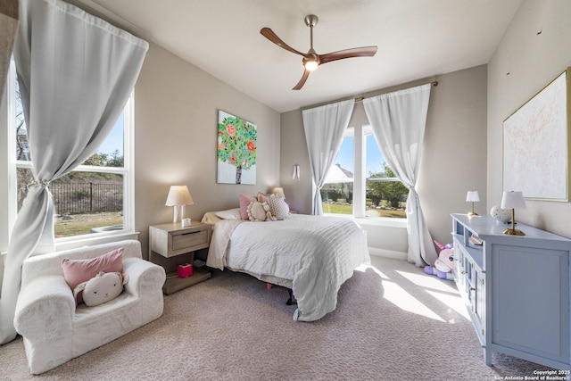 carpeted bedroom featuring a ceiling fan