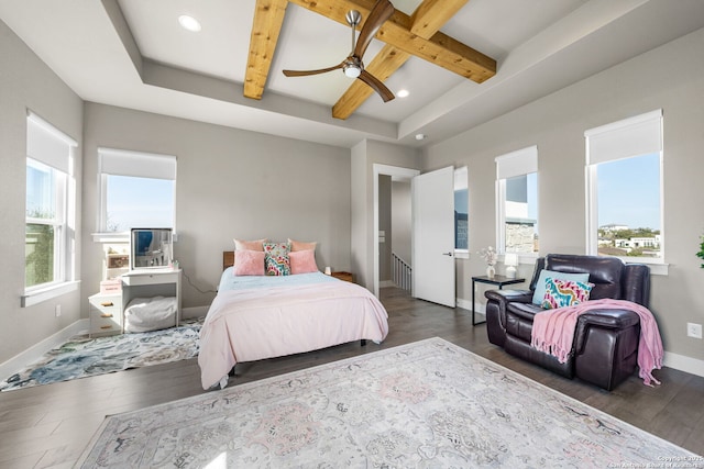 bedroom featuring recessed lighting, beamed ceiling, baseboards, and wood finished floors