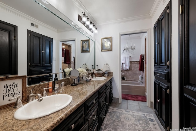 bathroom with visible vents, ornamental molding, a garden tub, tile patterned flooring, and a sink