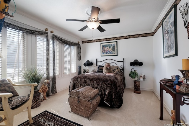 bedroom featuring carpet, multiple windows, and crown molding