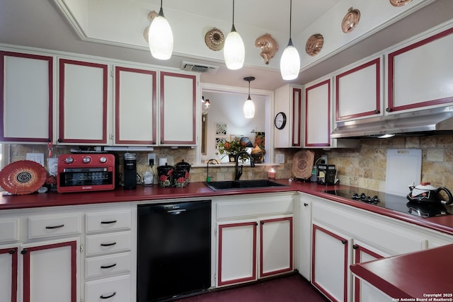 kitchen with visible vents, a sink, under cabinet range hood, black appliances, and backsplash