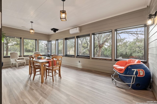 sunroom featuring a wall mounted air conditioner