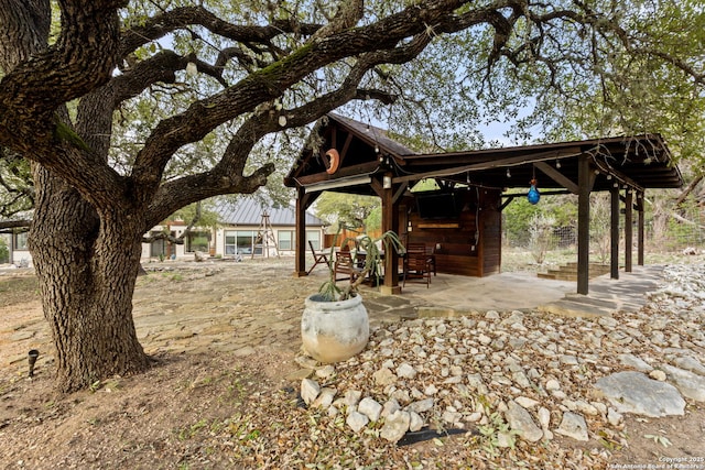 surrounding community featuring a patio area