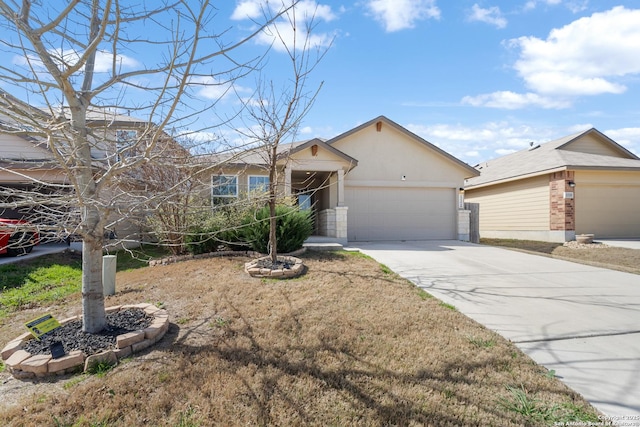 ranch-style home with a garage, driveway, and stucco siding