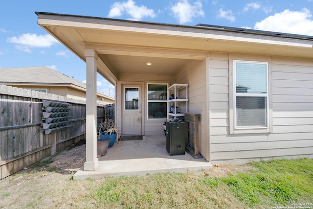 exterior space featuring fence and a patio