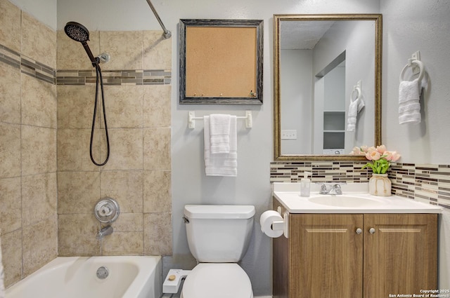 full bath featuring tasteful backsplash, vanity, toilet, and bathing tub / shower combination