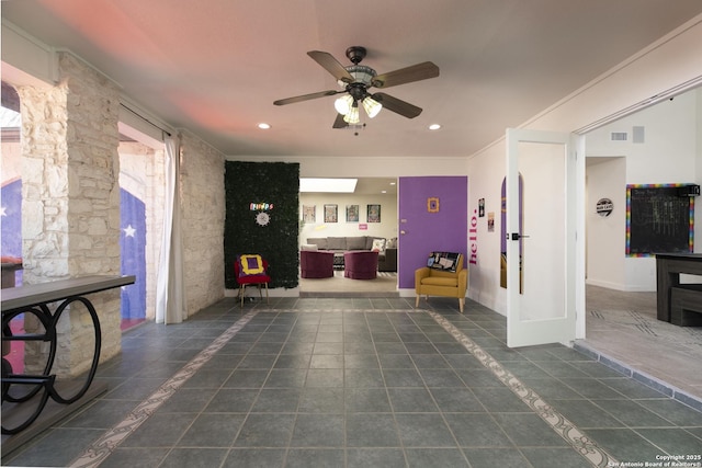 sitting room featuring tile patterned floors, ceiling fan, crown molding, and recessed lighting