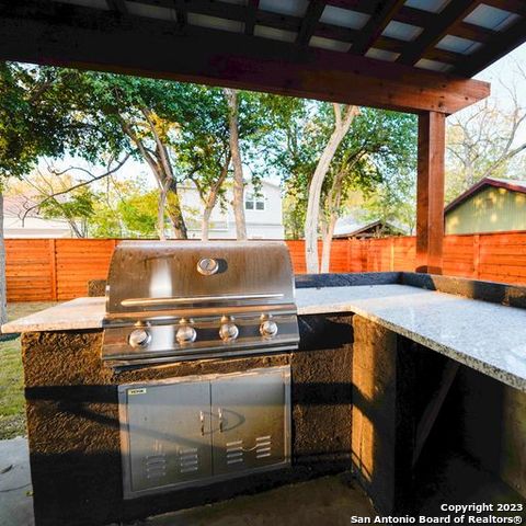 view of patio with a fenced backyard, grilling area, and area for grilling