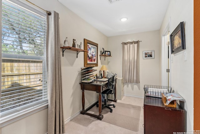 office with light carpet, visible vents, and baseboards