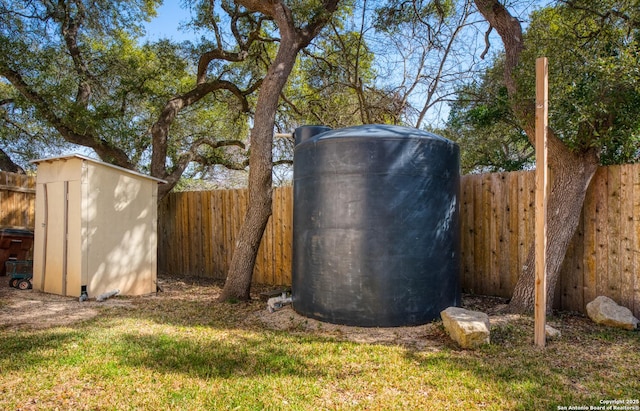 view of shed featuring a fenced backyard