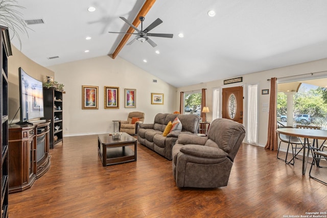 living area with vaulted ceiling with beams, dark wood-style floors, visible vents, and a wealth of natural light