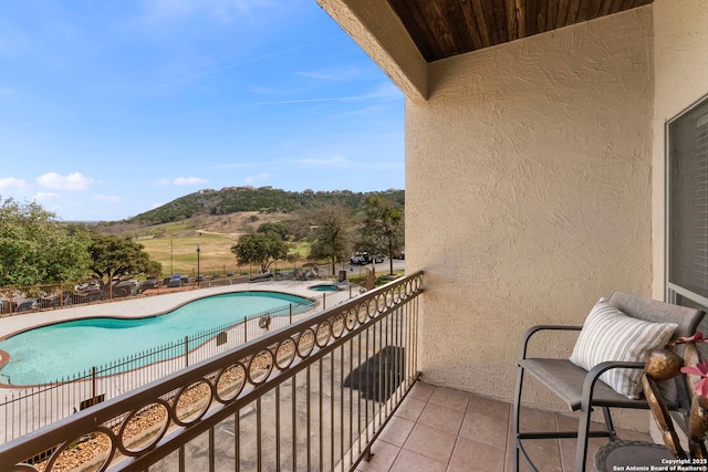 balcony featuring a mountain view