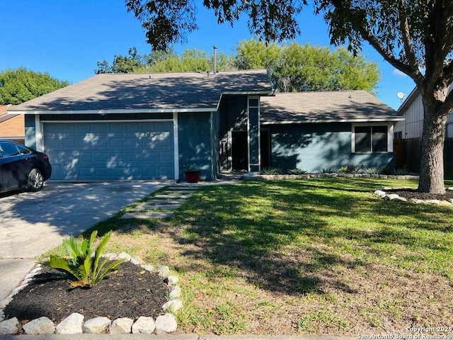 ranch-style home featuring a front yard, brick siding, driveway, and an attached garage