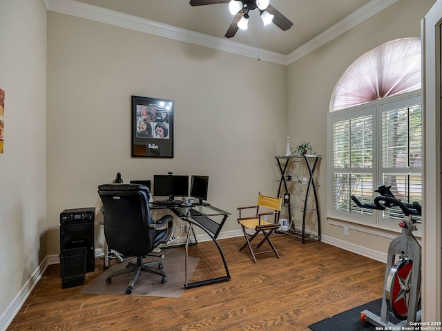 home office with baseboards, ornamental molding, ceiling fan, and wood finished floors