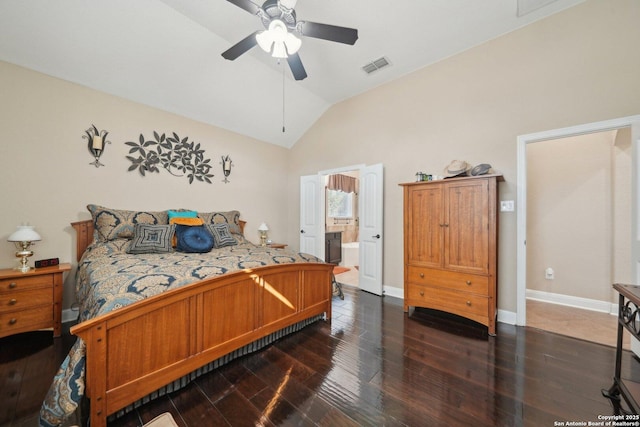 bedroom featuring lofted ceiling, baseboards, visible vents, and dark wood-type flooring