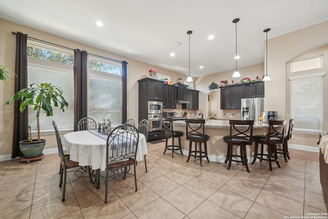 dining room with recessed lighting, visible vents, baseboards, and light tile patterned floors