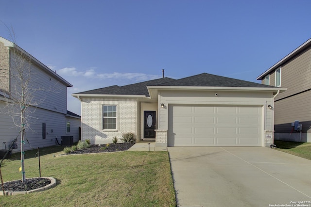 view of front of house featuring concrete driveway, an attached garage, central air condition unit, a front lawn, and brick siding