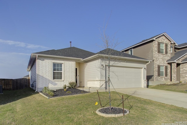 traditional home featuring brick siding, concrete driveway, fence, a garage, and a front lawn