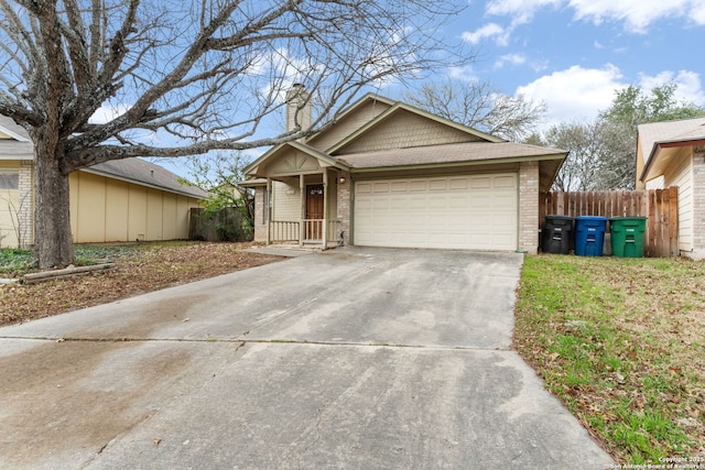 single story home with a garage, brick siding, fence, driveway, and a chimney