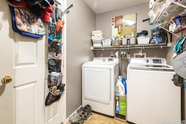 laundry room featuring laundry area and separate washer and dryer