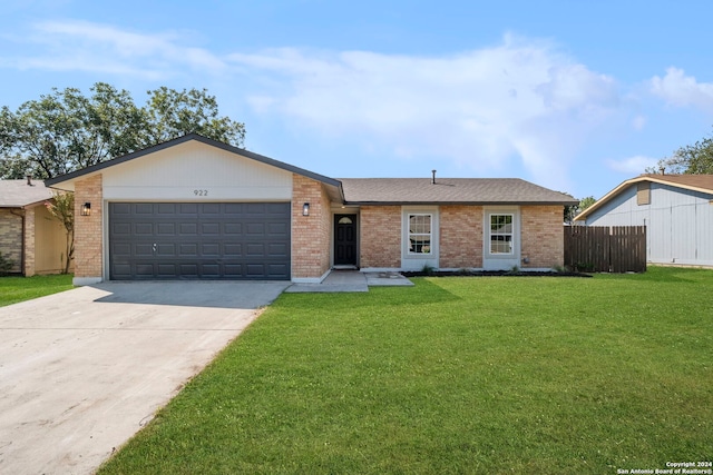 single story home with a garage, driveway, brick siding, and a front lawn