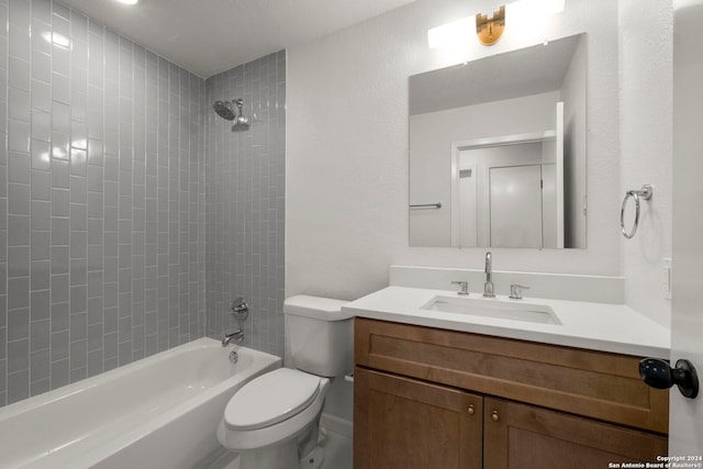 full bathroom featuring toilet, bathtub / shower combination, and vanity