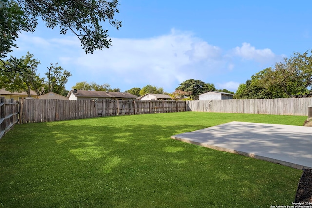 view of yard featuring a fenced backyard