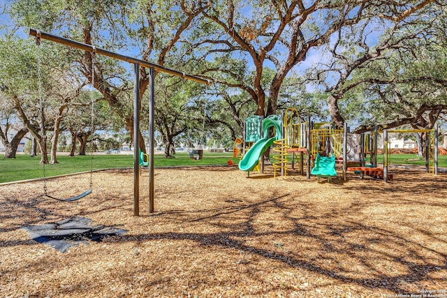 community playground featuring a yard