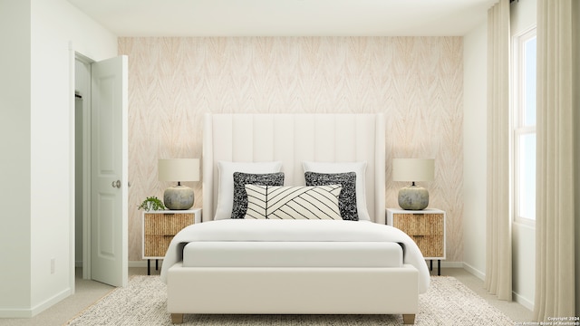 carpeted bedroom with an accent wall, baseboards, and wallpapered walls