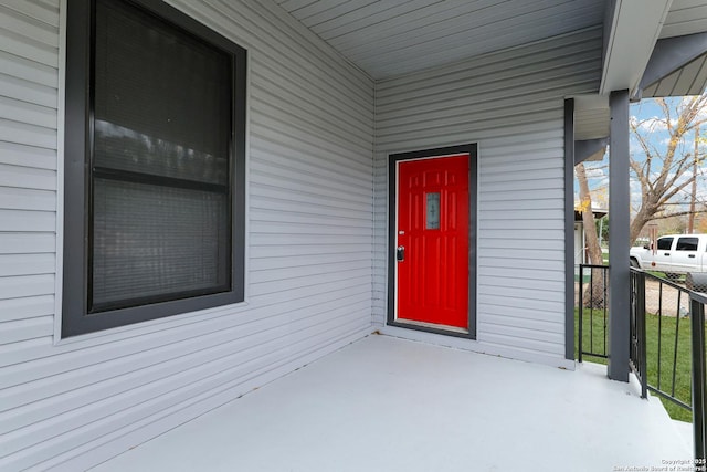 entrance to property with a porch