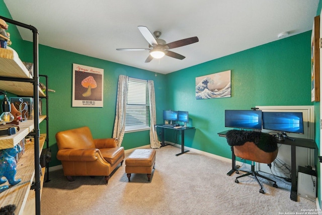 office area with ceiling fan, carpet floors, and baseboards