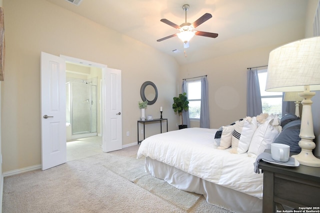 bedroom featuring carpet floors, baseboards, vaulted ceiling, and a ceiling fan