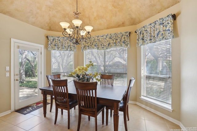 17110 Eagle Holw, San Antonio, TX 78248 - dining room featuring baseboards, light tile patterned floors, plenty of natural light, and a notable chandelier