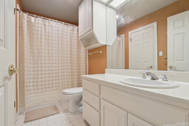 17110 Eagle Holw, San Antonio, TX 78248 - full bathroom with tile patterned flooring, a shower with shower curtain, vanity, and toilet