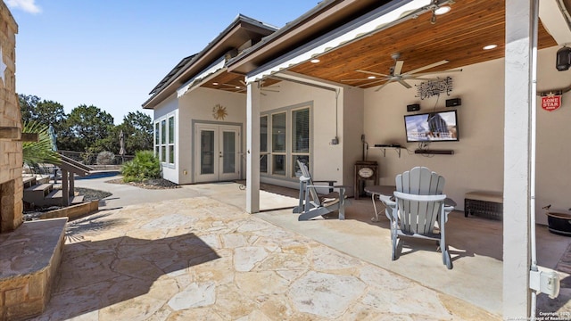 view of patio / terrace with ceiling fan and french doors