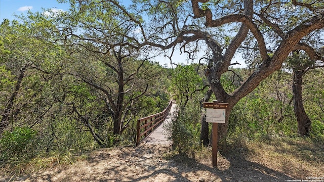 surrounding community with a view of trees