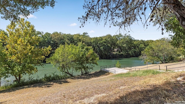 view of water feature with a floating dock