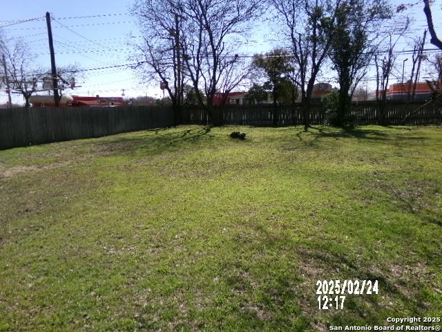 view of yard featuring fence